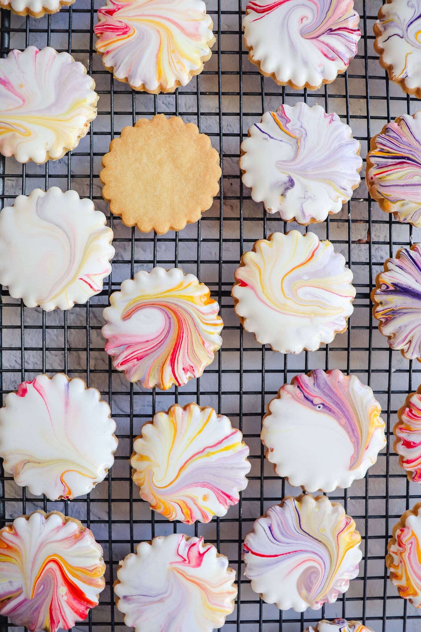 Biscuits iced with a marbled icing