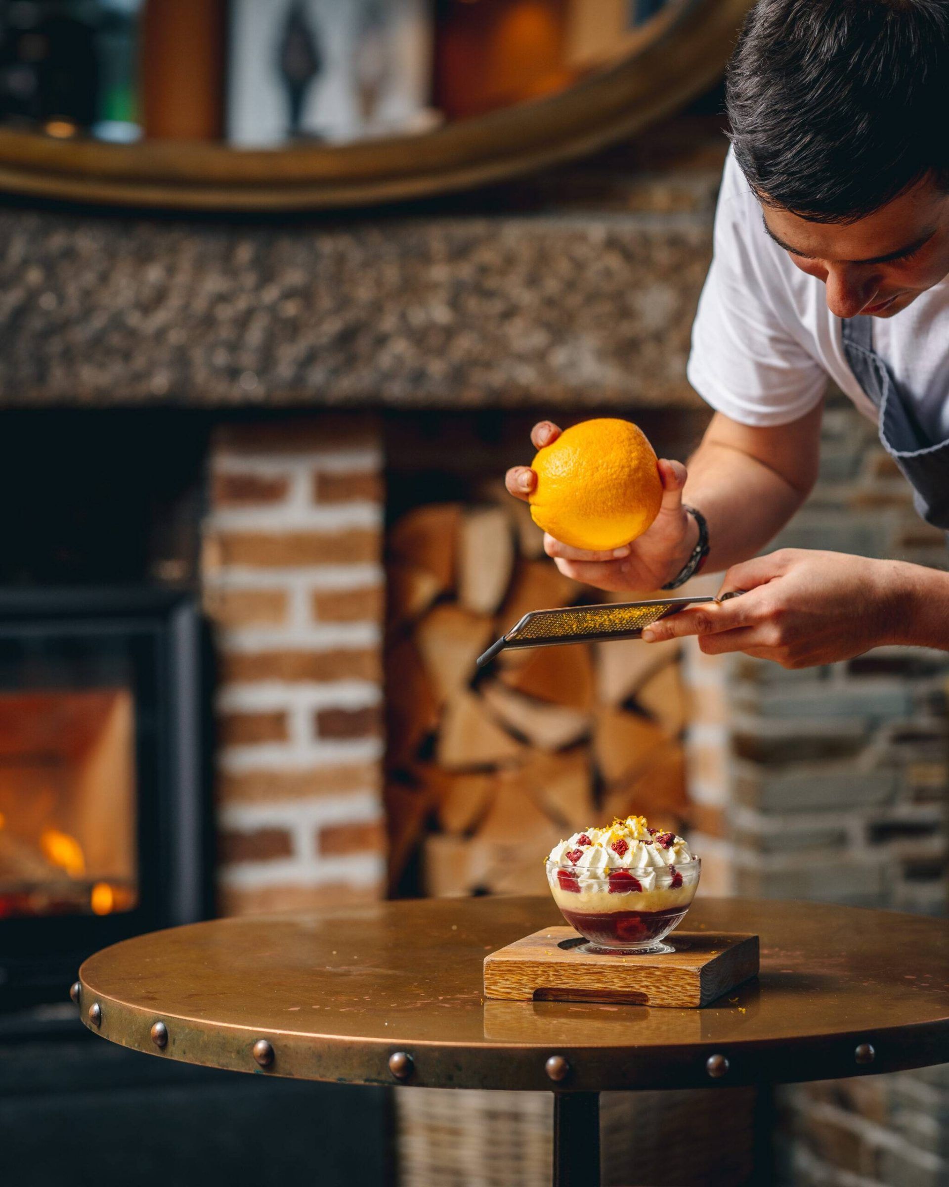 Paul Ainsworth grating an orange over a trifle - yum!