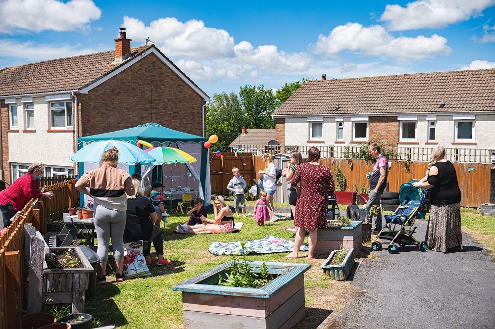 A community gathered in a garden