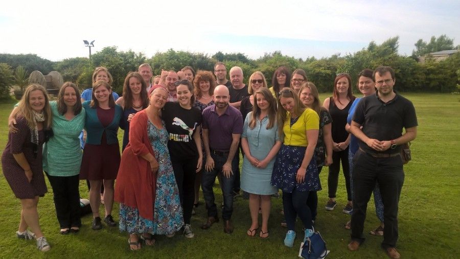 A group of people outside in a park