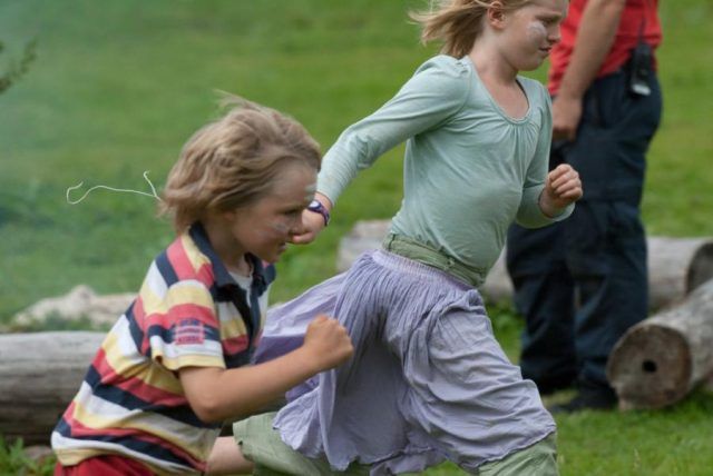 Two children running