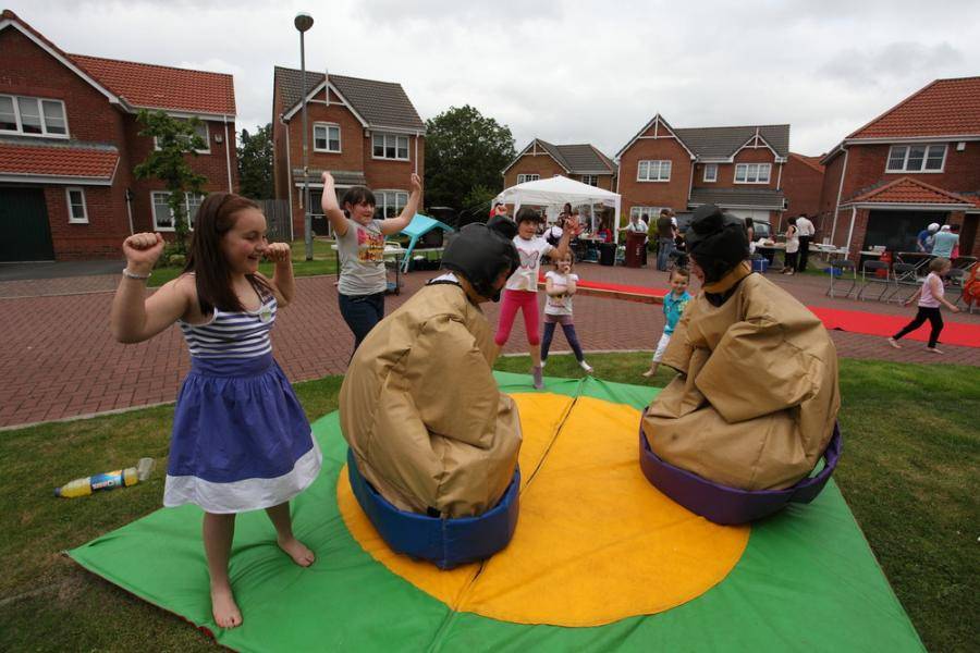 Children playing 'It's a knockout game'