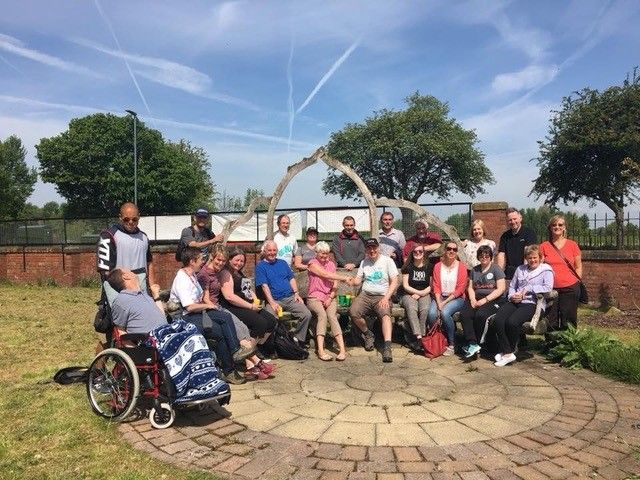 Group of people outside on a sunny day