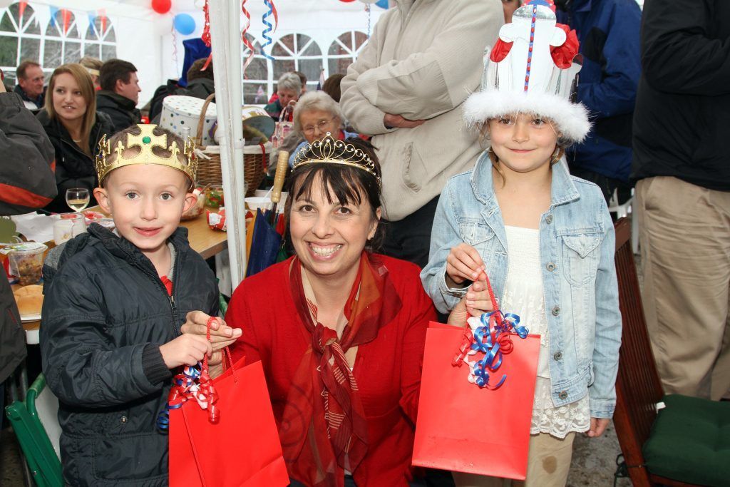 Children getting red gift bags