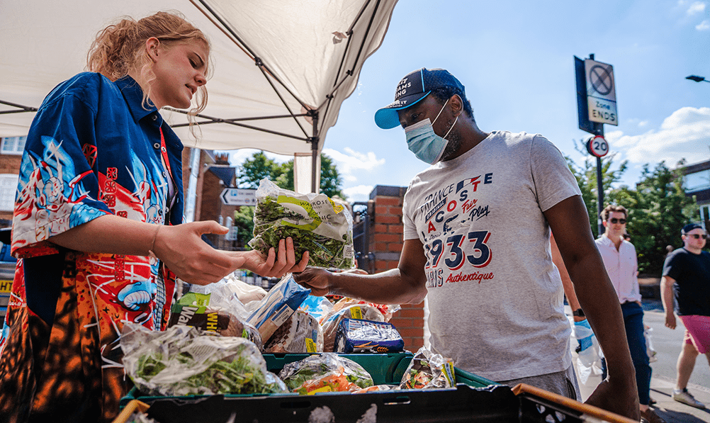 Woman giving out food