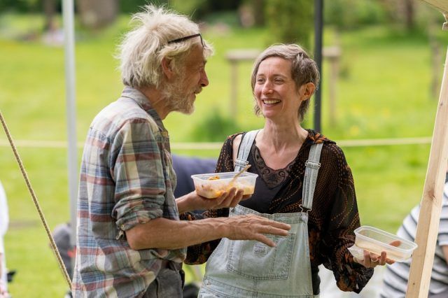 Volunteers eating and talking