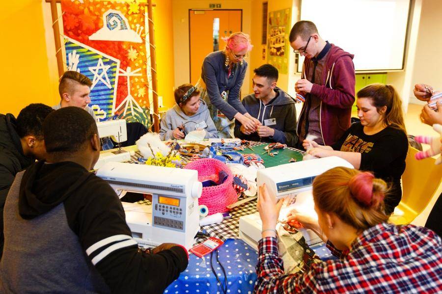 Group of volunteers working around a table