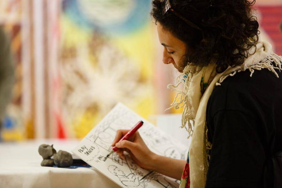 Woman working in a notebook