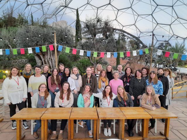 Eden Project Communities team standing in a biome at the Eden Project.