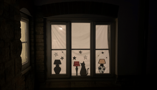 Window with homemade crafted silhouettes