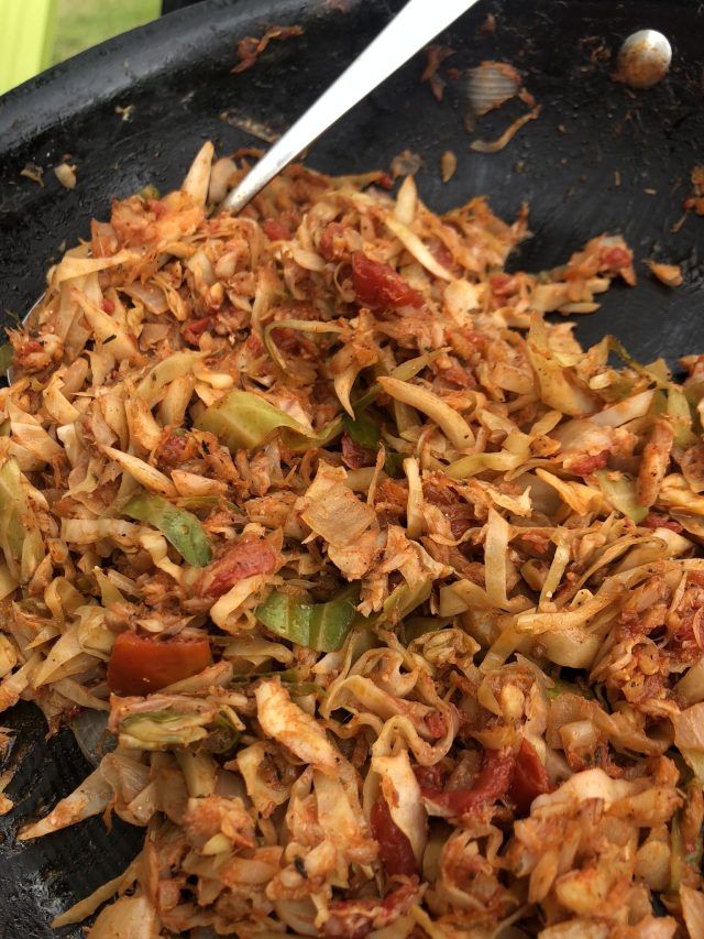 Salt fish and cabbage cooking together