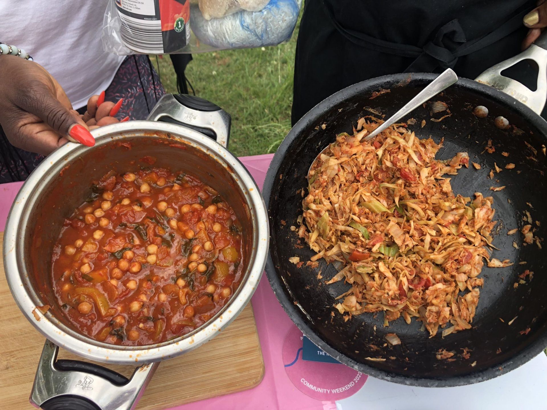 Salt fish stew in one pan, with a vegan chickpea option next to it