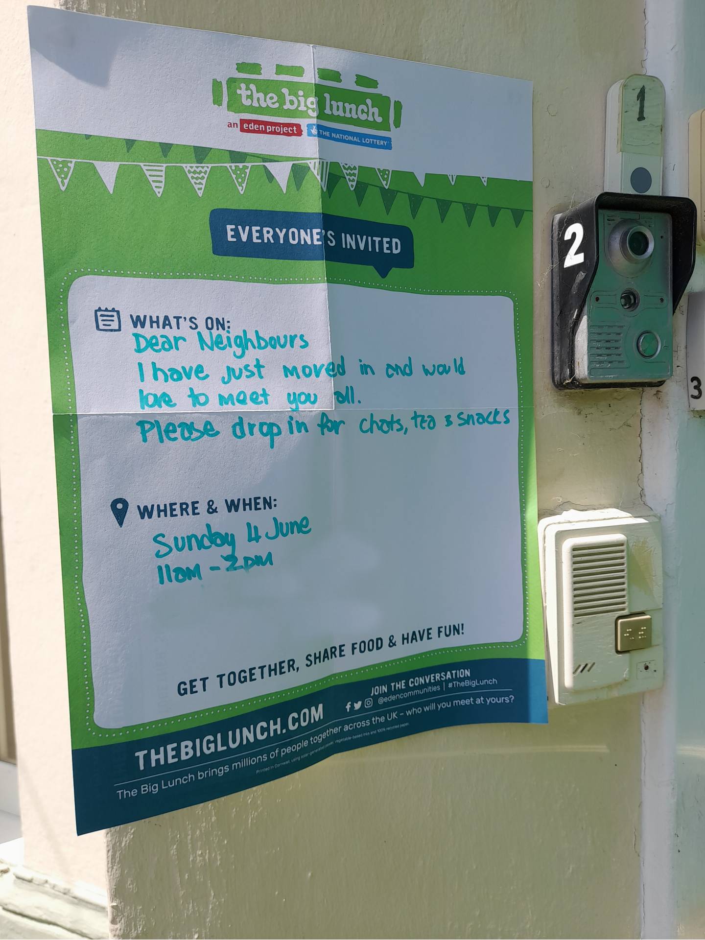 The Big Lunch branded poster with handwriting inviting neighbours round for a cup of tea and snacks